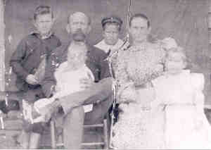 Charles Christopher Breazeale Family  (187 KB)
1855 
Henry Clayton Breazeale (big ears, trademark) B: 1888, Seated: Charles Christopher, B: 1854, in his lap: Herschel Williamson, B: 1895, Standing, George Norman, B: 1890, Seated, Mary Jane (Mollie) Trout, B: 1867, Standing: Etta Estelle, B: 1892
(Click on Picture to View Full Size)